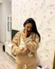 A dançarina Ilona Gvozdeva tocou a Rede com uma foto de seu filho recém-nascido